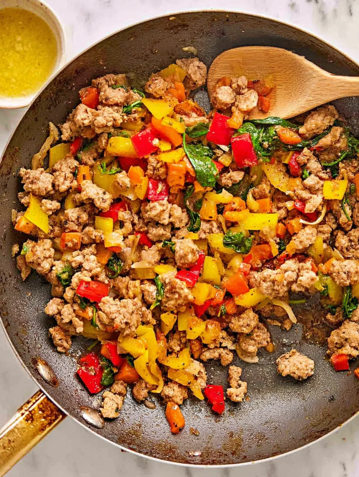 Ground turkey recipes showing proper browning technique in a skillet