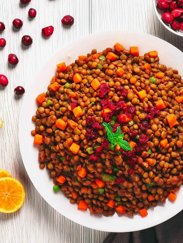 Close-up of lentil and cranberry salad variations with diced vegetables (healthy lentil and cranberry salad variations)