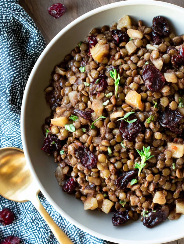 Closeup of lentil and cranberry salad variations with walnuts and parsley (lentil and cranberry salad variations homemade)
